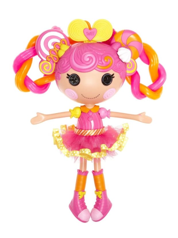 doll with button eyes and pink hair